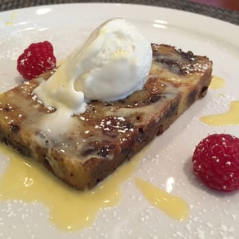 Steenbock's On Orchard - Bread pudding with some sort of ice cream. Melted. Kind. Too rich for me I only ate the berries and two bites of pudding - New American Near Me - Madison, Wisconsin