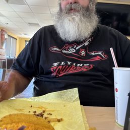 Steve eating OG Barstow Tacos intently