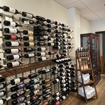 Awakenings Coffee & Wine - a wall of wine bottles - Coffee & Tea Near Me - Cincinnati, Ohio Awakenings Coffee & Wine - a wall of wine bottles - Coffee & Tea Near Me - Cincinnati, Ohio