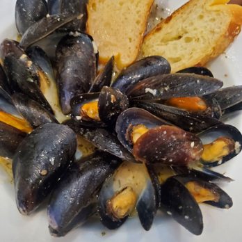 Monalisia - Mussels in white garlic sauce - also awesome to dip the bread in. - Italian Near Me - Williamstown, New Jersey Monalisia - Mussels in white garlic sauce - also awesome to dip the bread in. - Italian Near Me - Williamstown, New Jersey