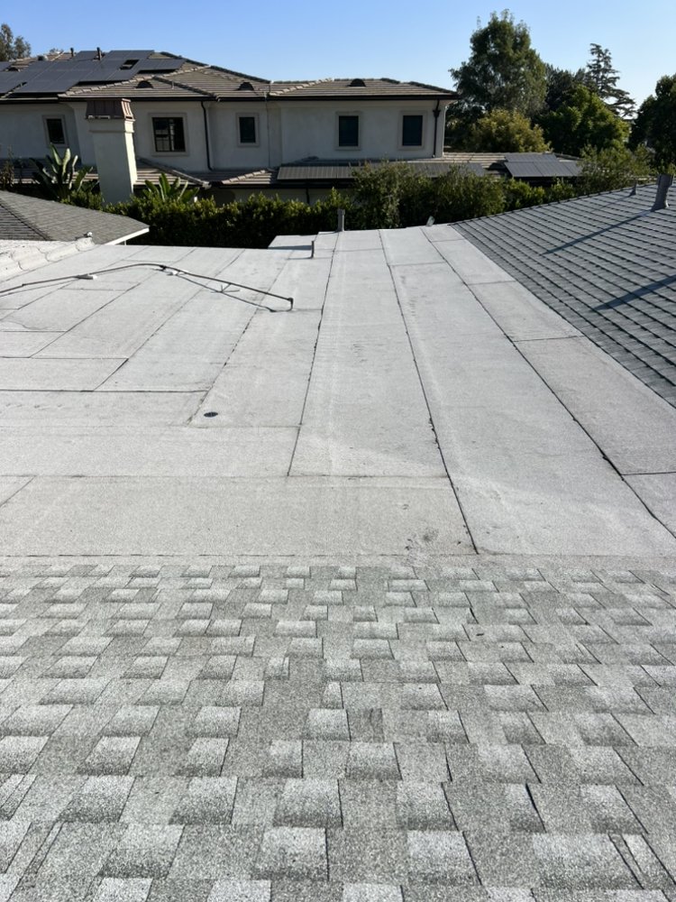 Slide of JVR Quality Roofing