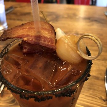Raven and Lily restaurant - Bloody Mary, I love the smoked pearl onion added to the garnish. - Southern Near Me - Collierville, Tennessee