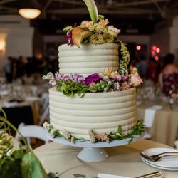 Sugar, Butter, Chocolate - Blueberry peach wedding cake made with seasonal fruit and adorned with flowers from our florist.