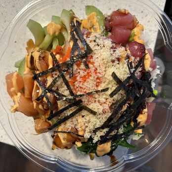 Nori Poke Bowl - a person holding a bowl of food - Chicken Wings Near Me - Exton, Pennsylvania Nori Poke Bowl - a person holding a bowl of food - Chicken Wings Near Me - Exton, Pennsylvania