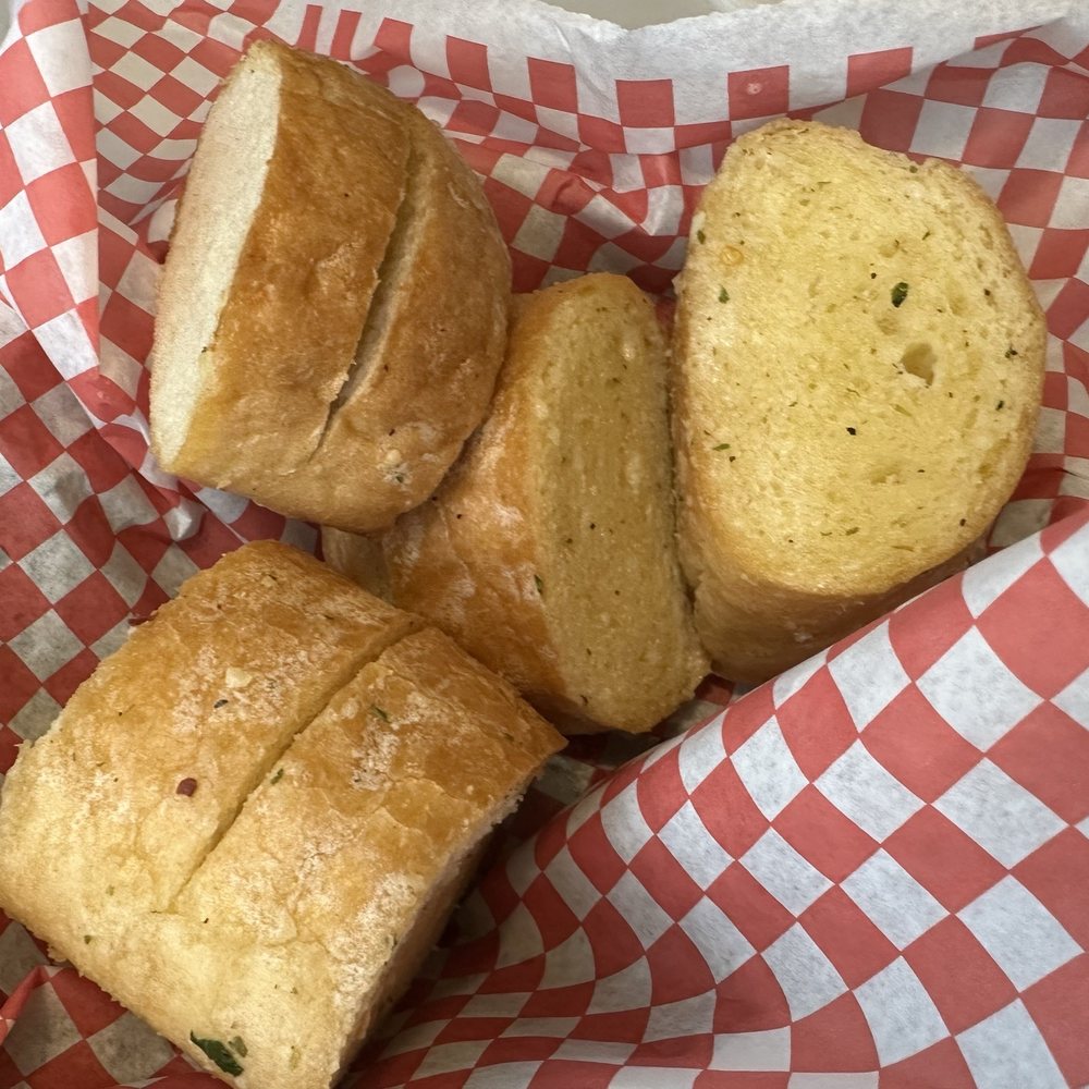 Tomato Street - Basket of garlic bread goodness - Italian Near Me - Spokane, Washington Tomato Street - Basket of garlic bread goodness - Italian Near Me - Spokane, Washington