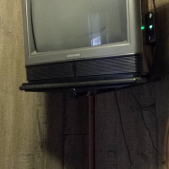 Whittemore Inn - a television mounted on the wall - Burgers Near Me - Whittemore, Michigan Whittemore Inn - a television mounted on the wall - Burgers Near Me - Whittemore, Michigan