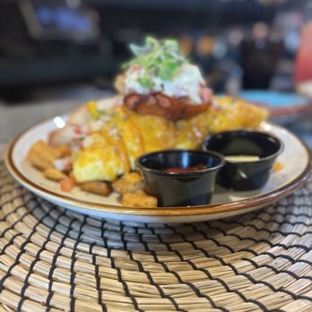 Madame Fortune - a plate of food on a table - Caribbean Near Me - Tampa, Florida