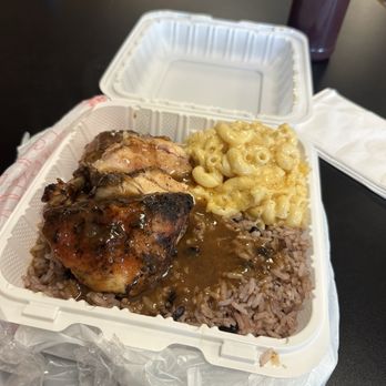 Angies Jamaican Grill - Jerk chicken , rice and peas and Mac and cheese with extra gravy. - Caribbean Near Me - Durham, North Carolina Angies Jamaican Grill - Jerk chicken , rice and peas and Mac and cheese with extra gravy. - Caribbean Near Me - Durham, North Carolina