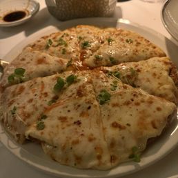 Chicken Parm Alla Vodka Pizza- buffalo mozzarella, chicken milanese, pesto, fresh basil, calabrian chili