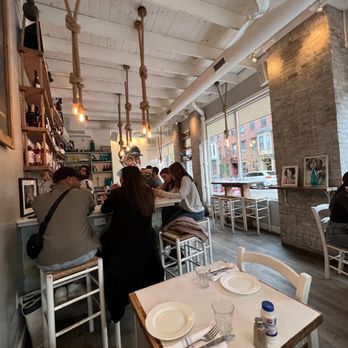 KAVA neo-taverna - people sitting at tables - Greek Near Me - Boston, Massachusetts KAVA neo-taverna - people sitting at tables - Greek Near Me - Boston, Massachusetts