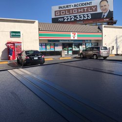 7-Eleven - 7-Eleven on Sunday afternoon when the jerk clerk works here.