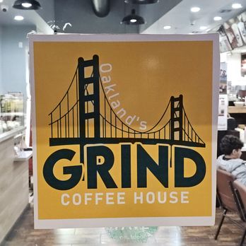 Oakland's Grind Coffee House - Signage on the door - Coffee & Tea Near Me - Oakland, California