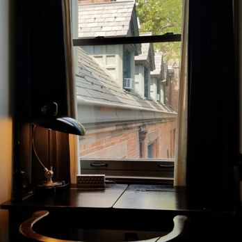 The High Line Hotel - Old writing desk with lamp and embossing stamp. Dormer window view onto courtyard. - Hotels Near Me - New York, New York