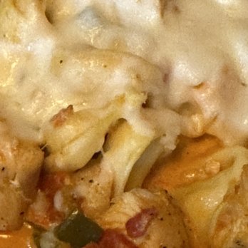 The Brick - Three Cheese Tortellini with tomato sauce and chicken serve with a 1/2 toasted garlic hoagie bread piece. - Pizza Near Me - Macon, Georgia The Brick - Three Cheese Tortellini with tomato sauce and chicken serve with a 1/2 toasted garlic hoagie bread piece. - Pizza Near Me - Macon, Georgia
