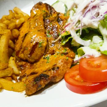 Imperio - Pork Cutlets with Fries and Salad - Portuguese Near Me - Montreal, Quebec Imperio - Pork Cutlets with Fries and Salad - Portuguese Near Me - Montreal, Quebec