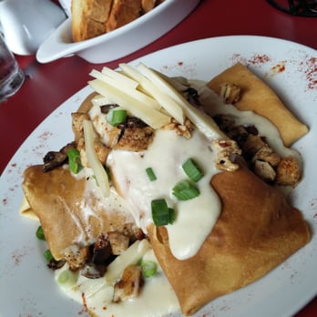 Cafe Conti - Chicken and mushroom crepe. So freaking good. - Breakfast & Brunch Near Me - New Orleans, Louisiana Cafe Conti - Chicken and mushroom crepe. So freaking good. - Breakfast & Brunch Near Me - New Orleans, Louisiana