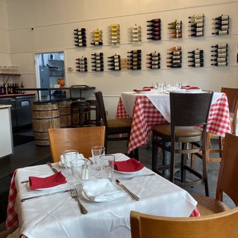 Caffe' da Michele - More inside restaurant. Love the checkered table cloths.. Italy comes to Ft Myers - Italian Near Me - Estero, Florida Caffe' da Michele - More inside restaurant. Love the checkered table cloths.. Italy comes to Ft Myers - Italian Near Me - Estero, Florida