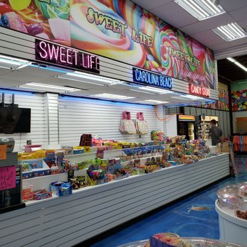 Sweet Life Candy Shop - a woman standing in front of the candy counter - Candy Stores Near Me - Carolina Beach, North Carolina Sweet Life Candy Shop - a woman standing in front of the candy counter - Candy Stores Near Me - Carolina Beach, North Carolina