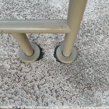 Tucson Pool And Spa - Heavily stained CoolDeck and seeping concrete from the install. Handrail itself is also badly stained from concrete and grease. - Pool Cleaners Near Me - Tucson, Arizona Tucson Pool And Spa - Heavily stained CoolDeck and seeping concrete from the install. Handrail itself is also badly stained from concrete and grease. - Pool Cleaners Near Me - Tucson, Arizona