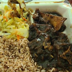 Yeh Mon Caribbean Restaurant - Large Oxtail plate with rice & peas and cabbage.