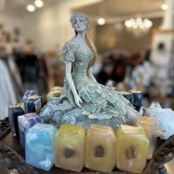 Larue's - Sculpture by Susan Snodgrass atop Crystal bar soap with wonderful natural essence's and stones in each bar.