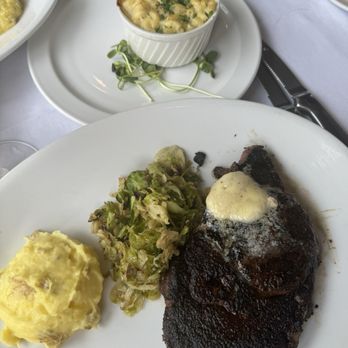 Fahrenheit 132 - USDA Prime Delmonico Ribeye side of Truffle Mac'n Cheese Rosemary Mashed Potatoes and brussel sprouts - Steakhouses Near Me - Fredericksburg, Virginia