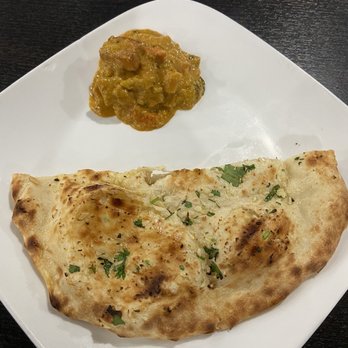 Sankranti - Garlic Naan( Popular) Navratan Korma- Medium Spicy - Indian Near Me - Sunnyvale, California Sankranti - Garlic Naan( Popular) Navratan Korma- Medium Spicy - Indian Near Me - Sunnyvale, California