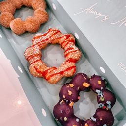 Top to bottom: churro, raspberry funnel and Ube Top to bottom: churro, raspberry funnel and Ube