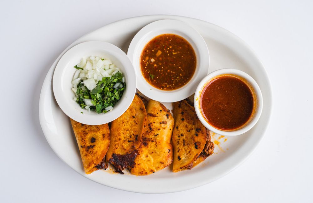 Mama Bertha Taqueria Logo