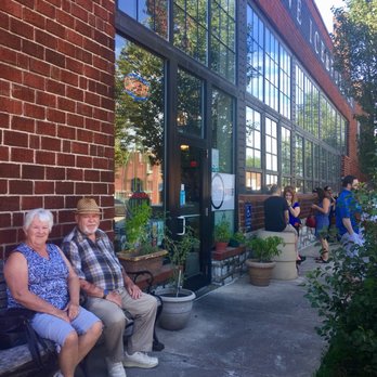 Egg - My sweet aunt and uncle patiently waiting for our table on a sweet bench outside. - Breakfast & Brunch Near Me - Saint Louis, Missouri Egg - My sweet aunt and uncle patiently waiting for our table on a sweet bench outside. - Breakfast & Brunch Near Me - Saint Louis, Missouri
