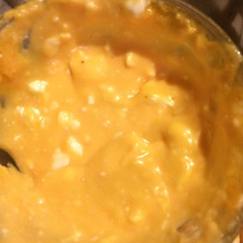 The Haven - Here's the cheese sauce for the breadsticks. Note the texture. Very disappointing. - Pizza Near Me - Rhinelander, Wisconsin