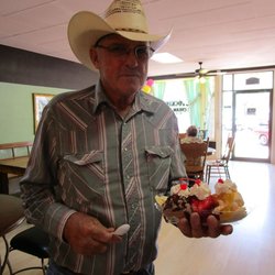 Stocking Ice Cream Parlor - Happy cowboy with his custom made banana split