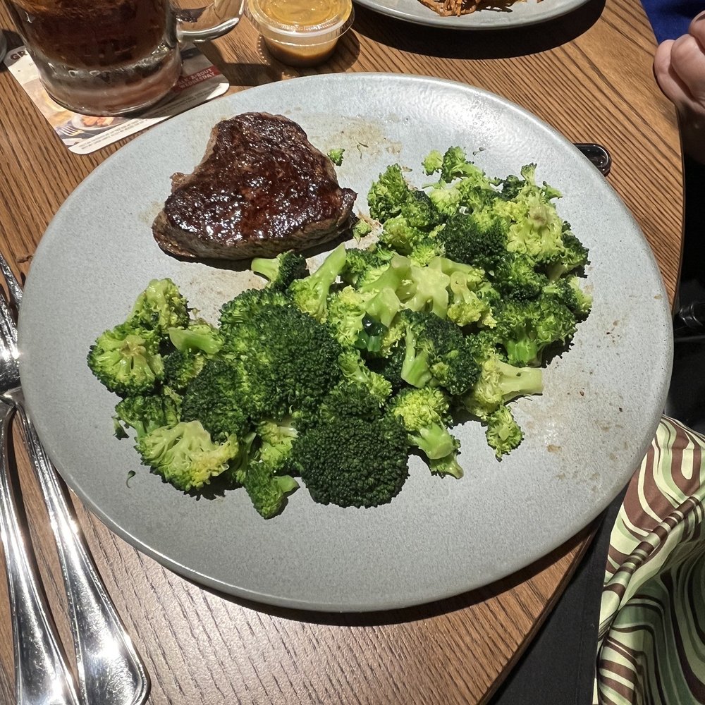 Outback Steakhouse - Center-Cut Sirloin* (6 oz) with two side of broccoli - Steakhouses Near Me - Miami, Florida Outback Steakhouse - Center-Cut Sirloin* (6 oz) with two side of broccoli - Steakhouses Near Me - Miami, Florida