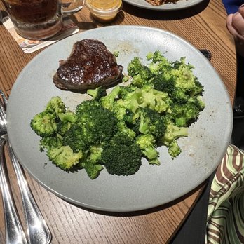 Outback Steakhouse - Center-Cut Sirloin* (6 oz) with two side of broccoli - Steakhouses Near Me - Miami, Florida Outback Steakhouse - Center-Cut Sirloin* (6 oz) with two side of broccoli - Steakhouses Near Me - Miami, Florida