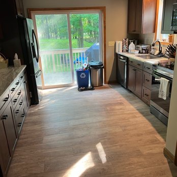 Burke Home Services - a kitchen with a sliding glass door - General Contractors Near Me - Stroudsburg, Pennsylvania Burke Home Services - a kitchen with a sliding glass door - General Contractors Near Me - Stroudsburg, Pennsylvania