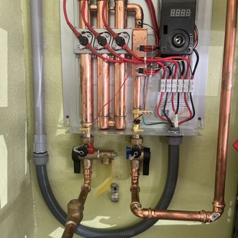 Continuum Electric - Tankless water heater hardwired - Electricians Near Me - Palm City, Florida