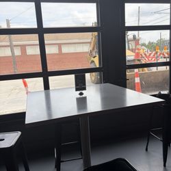 The Charlevoix - Window seating with garage doors that can open up