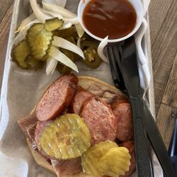 Combo brisket and sausage sandwich.