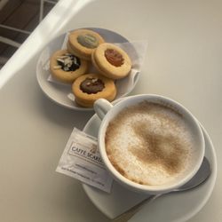 Le Cafe - Cappuccino with brown sugar, and a side of cookies!