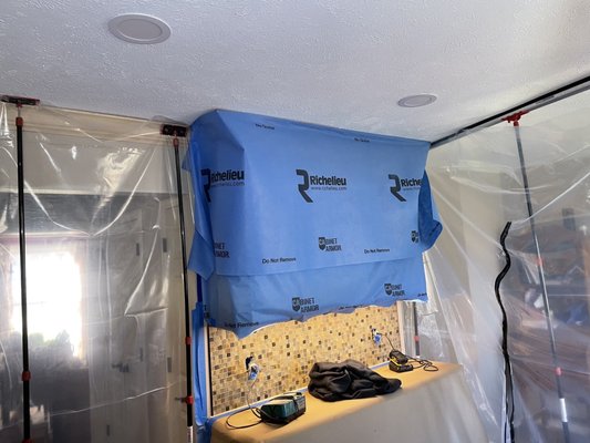 Emmanuel Painting And Remodeling Logo