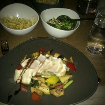 AURA 800° Grill & Bar - Main:  Grilled white tuna with basil, black olives and eggplant caviar.  Sides:  Pommes allumettes and Almond broccoli. - Swiss Food Near Me - Zürich, ZH