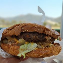 Nessy Burgers - Single Nessy Burger. 1/2 lb patty.... so delish!! Gorgeous view of the 15-Fwy while you enjoy your burger!!