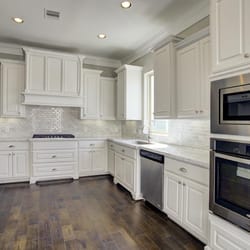 Zander Homes - Clean / White Cabinets - Gourmet Kitchen