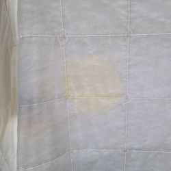 Quality Inn - Light yellow stain with red stain