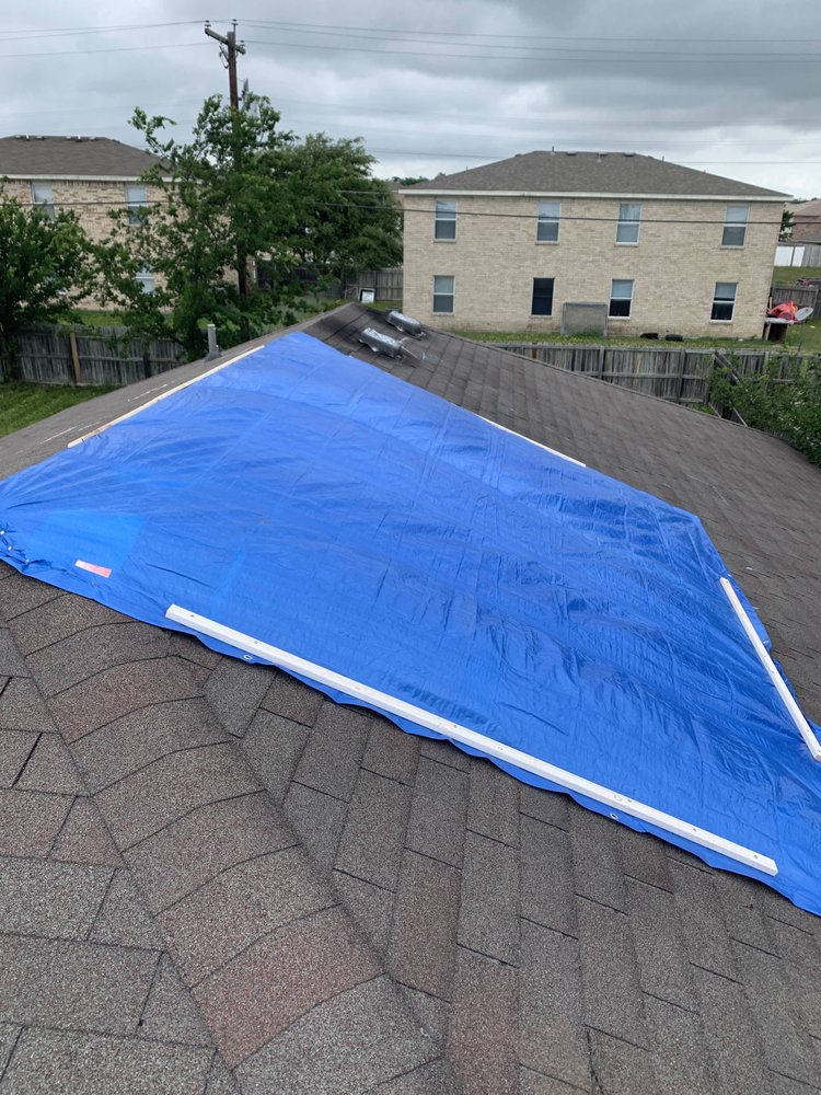 Slide of Top Notch Roofing