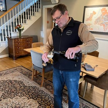 Argyle Winery - mark - such a great host!  pouring sparkling wine in the "spirit" house - Wineries Near Me - Dundee, Oregon