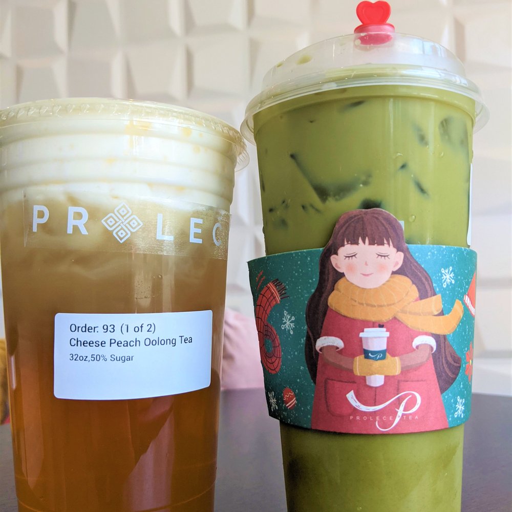 Prolece Tea - Left is the Peach Oolong Tea with cheese foam on top. Right is a double matcha with oat milk and no added sweetener. - Bubble Tea Near Me - Pasadena, California Prolece Tea - Left is the Peach Oolong Tea with cheese foam on top. Right is a double matcha with oat milk and no added sweetener. - Bubble Tea Near Me - Pasadena, California