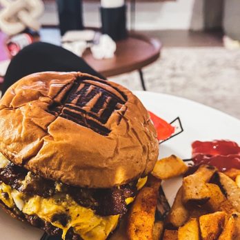 What The Food - a burger and fries on a plate - Burgers Near Me - Miami, Florida
