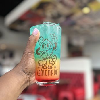 HangOverEasy - a hand holding a glass of lemonade - Breakfast & Brunch Near Me - Cincinnati, Ohio