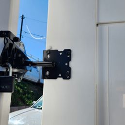 Latch won't latch properly. When the wind blows, the gate opens.